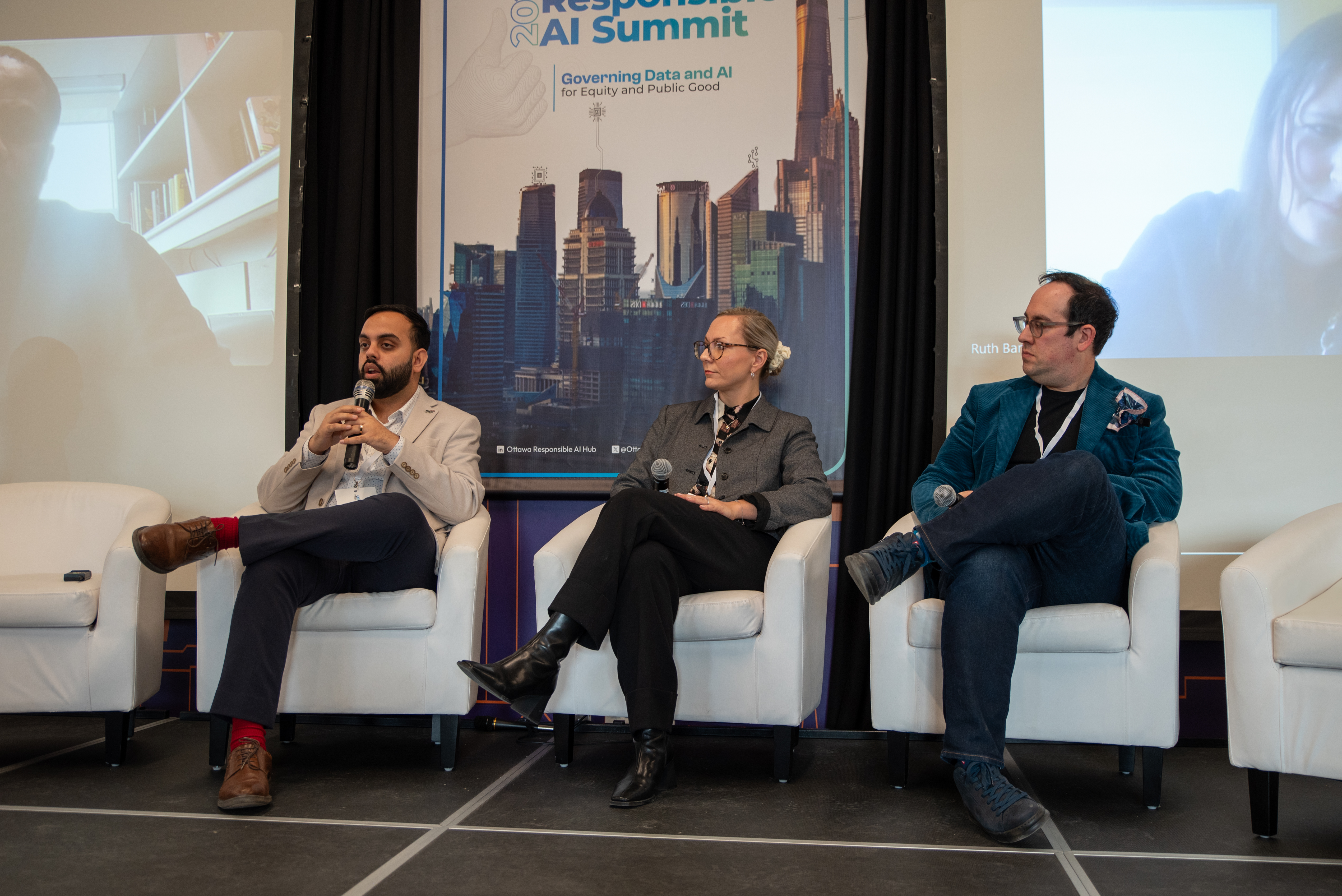 ORAIS 2025 — a panel discussion, with event branding visible on stage